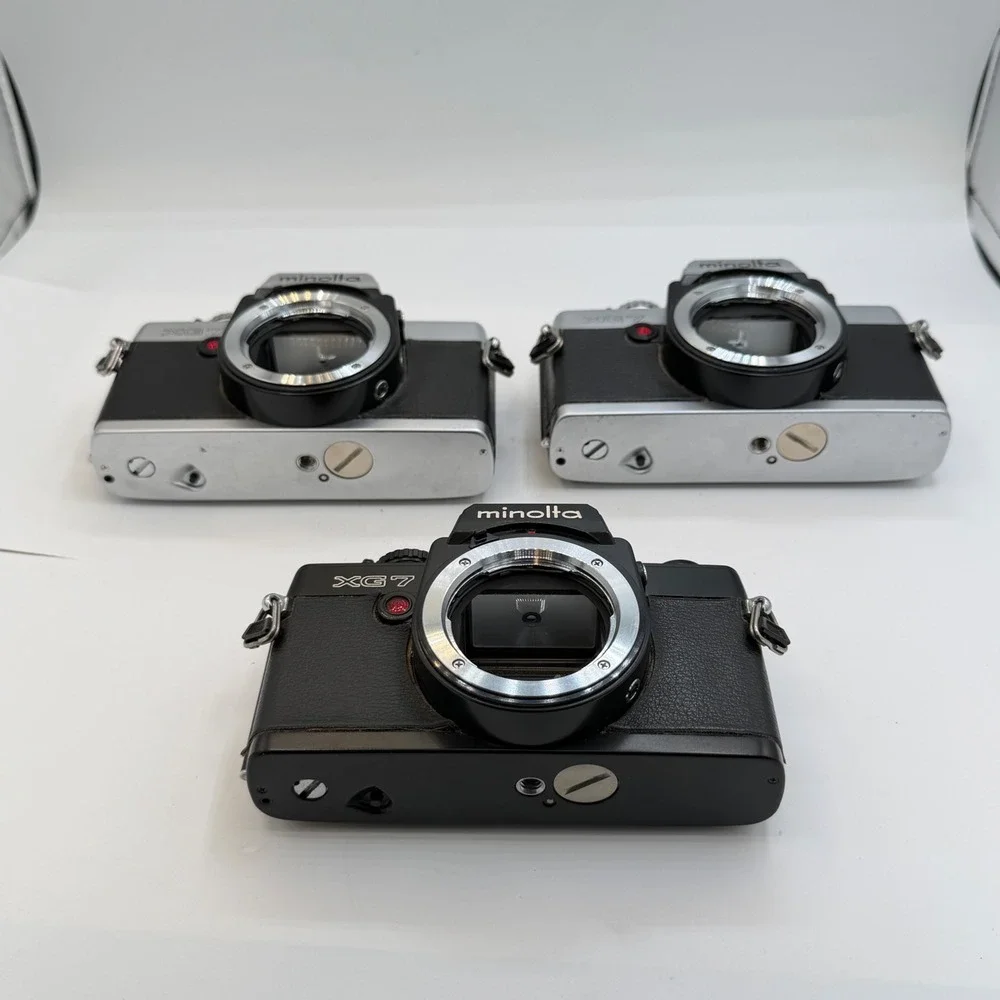 Lot of 3 Minolta XG-7 35mm SLR Film Camera Bodies Black Silver Vintage for Parts